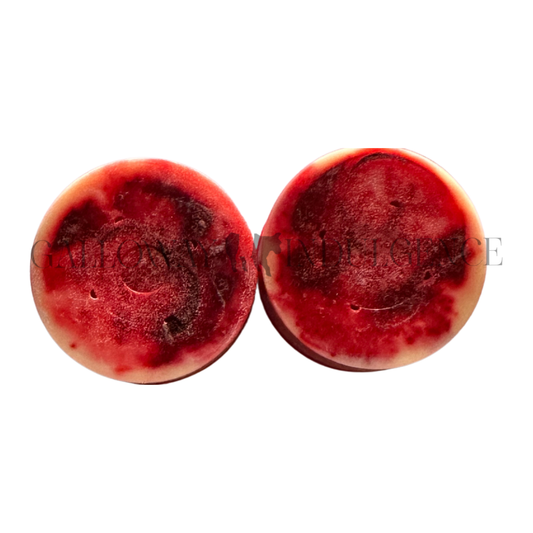 Two red marbled strong and long lasting wax melts. Australia's best and hand made wax melts. Fragranced in Diamonds a Paco Rabban Lady Million inspired fragrance.