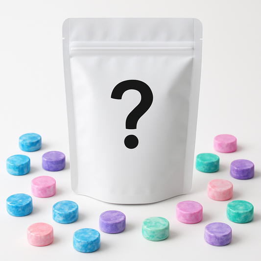 White stand up pouch with a black question mark surrounded by strong, high-quality colourful wax melts on a white background made in Australia.